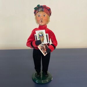 Buyers Choice Caroler; boy with postcards
